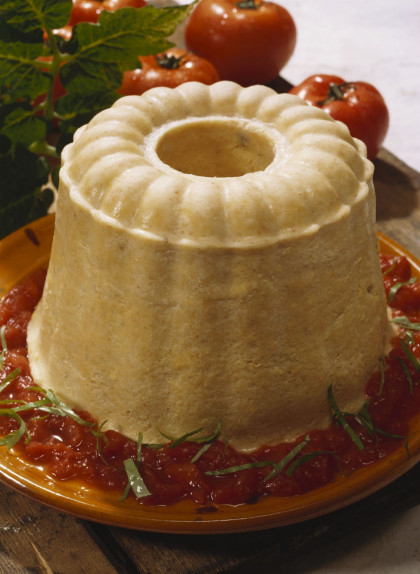 Fish mould with tomato sauce