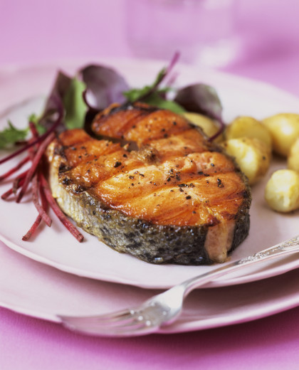 Grilled salmon steak with potatoes