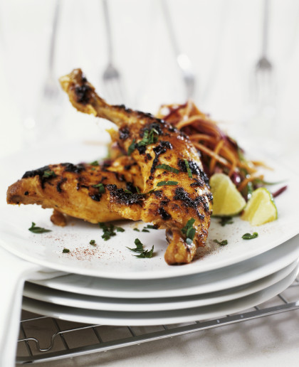 Spicy baked chicken legs with carrot salad