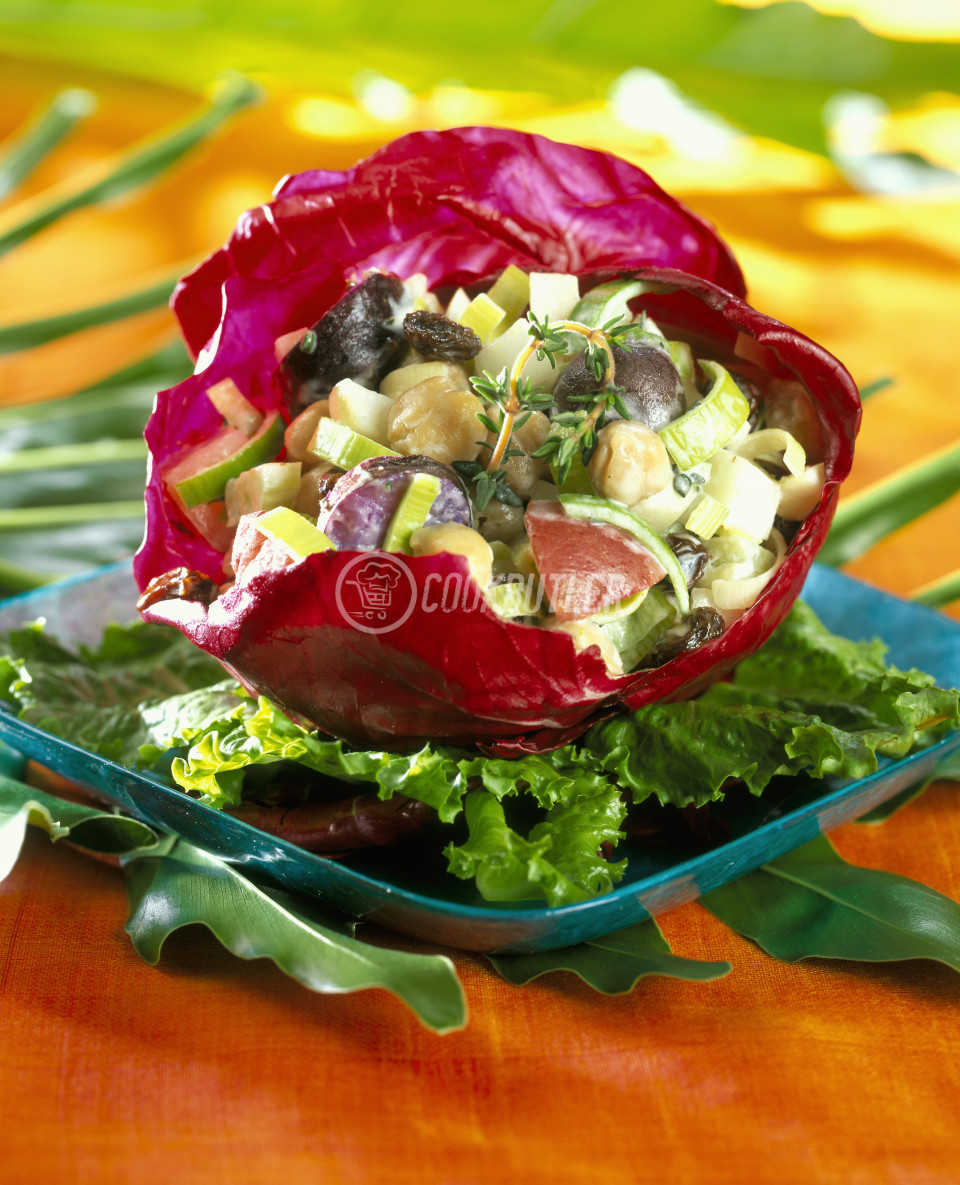 Potato and vegetable salad in a red cabbage leaf | preview