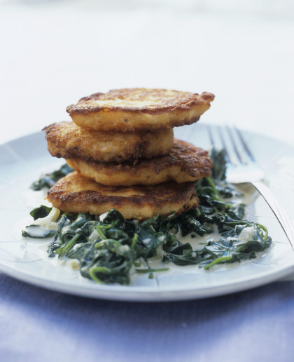 Salmon cakes on spinach