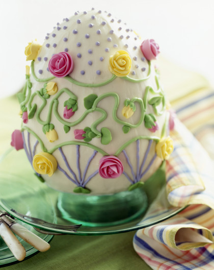 Easter egg cake with frosting rose decorations