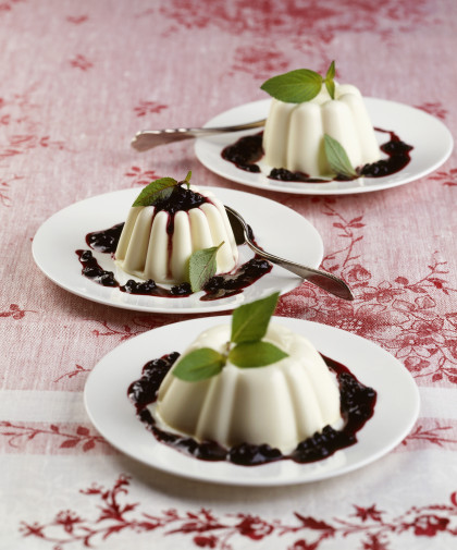 Yogurt and mascarpone dessert with stewed elderberries