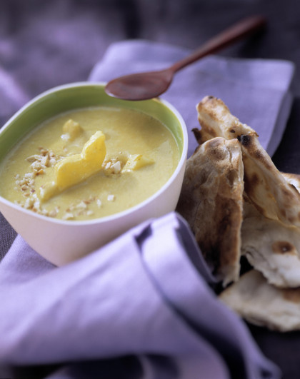 Indian curry soup with pineapple and naan bread