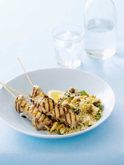 Grilled fish kebabs with orange and ginger, couscous