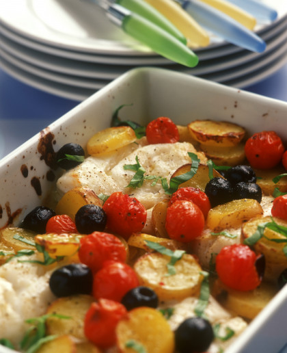 Cod with potatoes, olives and tomatoes
