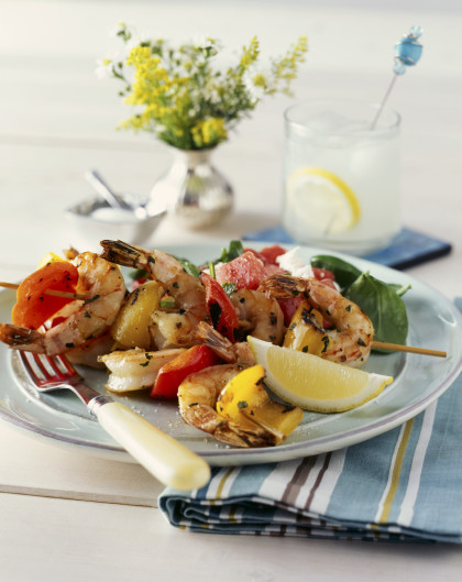 Grilled prawn kebab with red and yellow peppers