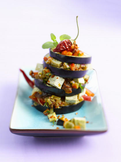 Aubergine tower with tofu, peppers and chilli