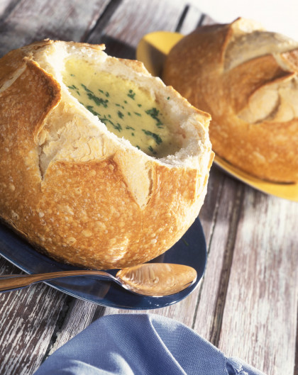 Gluten-free Brazilian maize soup in hollowed-out bread