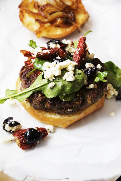 Lamb burger with feta, dried tomatoes and olives