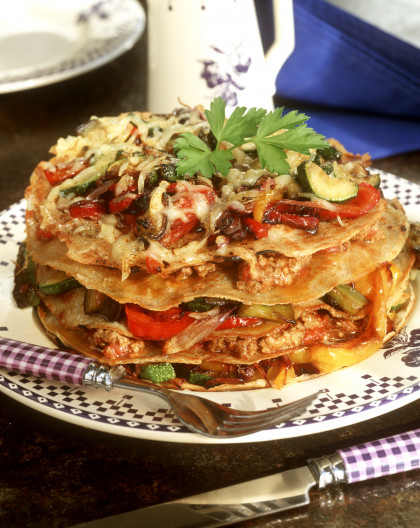 Pancake tower au gratin with vegetables and minced meat