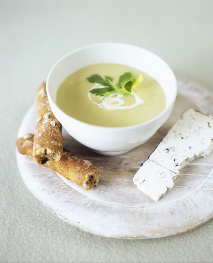 Cream of celeriac soup with blue cheese and savory stick