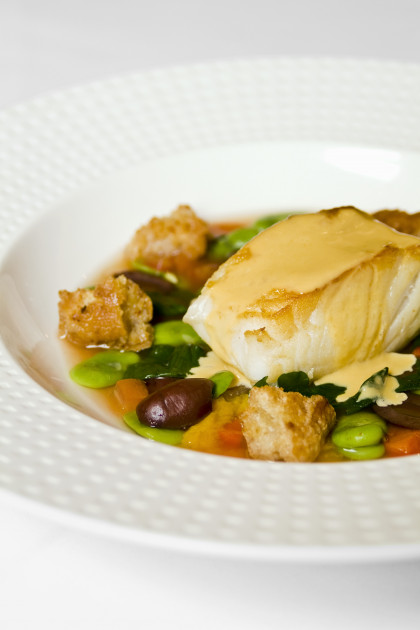 Seared sea bass with broad bean and rocket stew