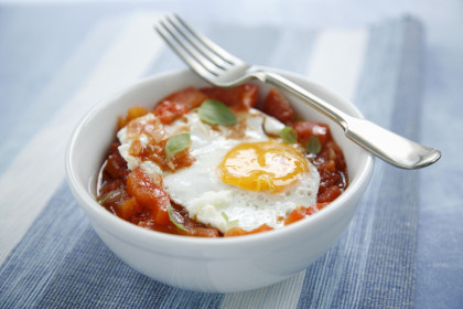Huevos rancheros (fried egg with peppers and tomatoes, Mexico)