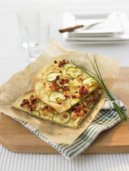 Tarte flambee with courgettes and bacon