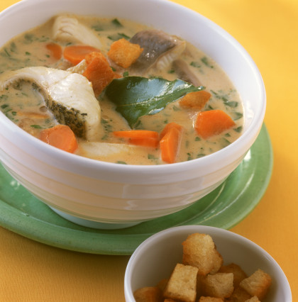 Fish soup with carp, carrots and croutons