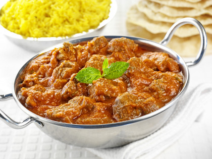 Rogan josh with saffron rice and poppadoms (Indian lamb curry)