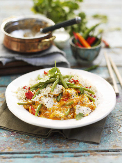 Red Thai curry with chicken and beans on a bed of fragrant rice