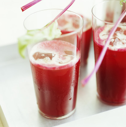Beetroot, ginger and apple juice over ice