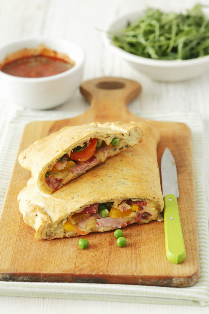 Calzone with ham, cheese, peppers and peas (gluten-free)