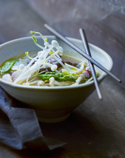 Asian vegetable soup with enoki mushrooms
