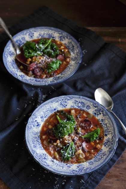 Vegetables soup with black beans, salsiccia and green kale