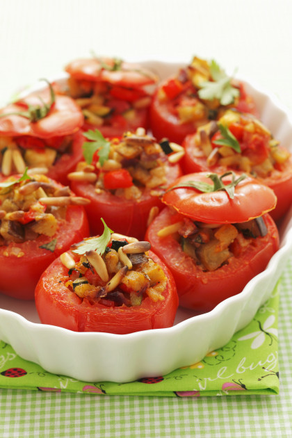 Tomatoes stuffed with ratatouille and pine nuts