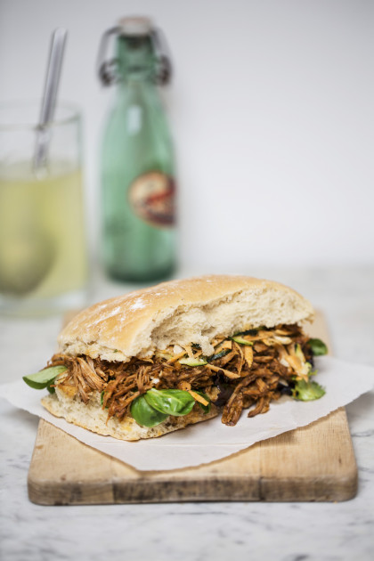 Pulled pork sandwich with basil