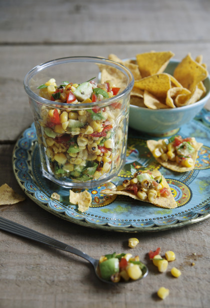 Sweetcorn and avocado salsa with limes and tomatoes