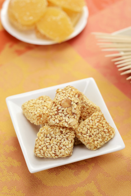 Apricot treats coated in sesame seeds