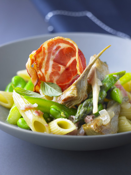 Penne with spring vegetables and pancetta