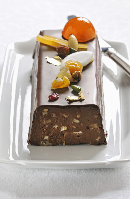 Chocolate, Calisson, dried fruit and candied fruit log cake