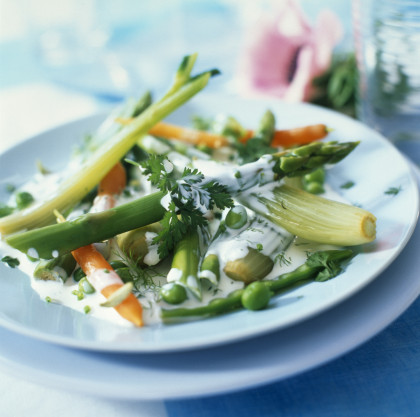 Steamed spring vegetables with herb cream
