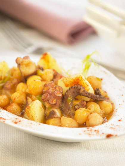 Small casserole dish of octopus and chickpeas