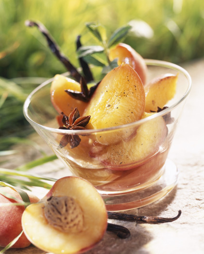 Peaches poached in banyuls with spices