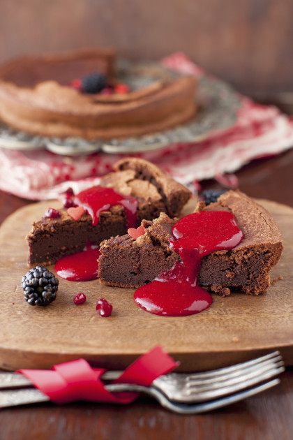 French Chocolate Cake Topped with Berry Coulis