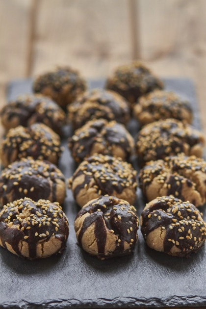 Gluten-free Polvorones with chocolate glaze and sesame seeds (Spanish biscuits)