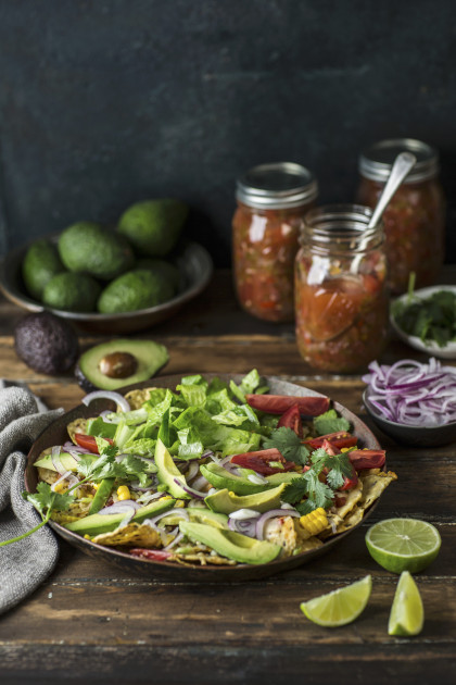 Nachos salad with avocado, tomatoes, sweetcorn and onions (Mexico)