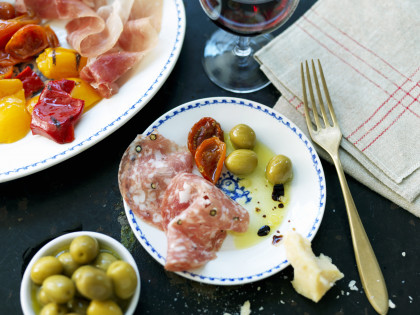 Antipasti with salami, olives and tomatoes
