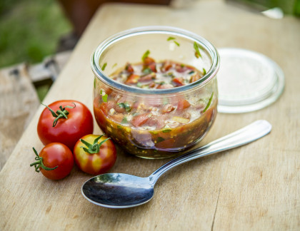 Tomato salsa with tomatoes, shallots, garlic, olive oil and basil