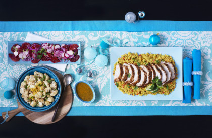 Moroccan roast turkey on couscous with cauliflower and salad