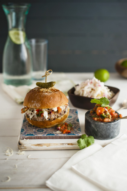 Moroccan lamb burger with mint yogurt, coleslaw and spicy tomato relish