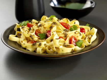 Tagliatelle with coriander and chilli pasta sauce and tomatoes
