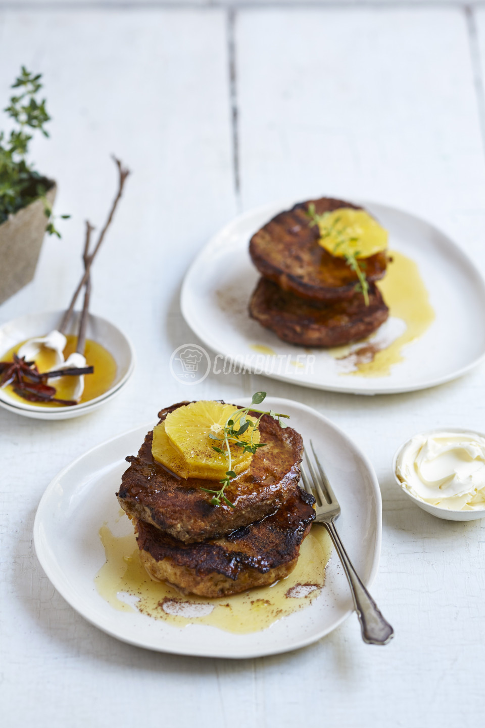 Hot cross bun French toast with orange slices and orange syrup | preview