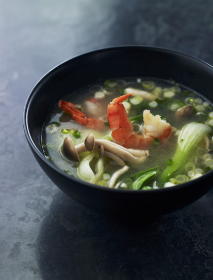 Asian soup with mushrooms, bok choy and prawns