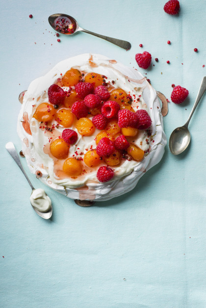 Pavlova with watermelon poached in rosé wine with raspberries, pink pepper and vanilla yogurt
