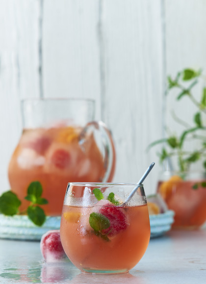 Fruity summer punch with pomegranate juice, mineral water