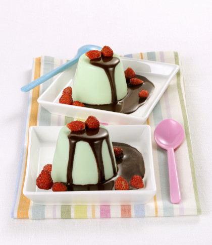 Panna cotta with mint, chocolate sauce and woodland strawberries (gluten-free)