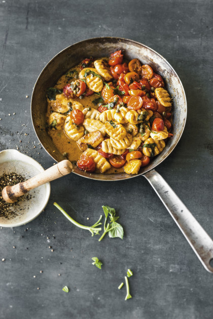Ricotta gnocchi with grilled tomatoes, capers and anchovies