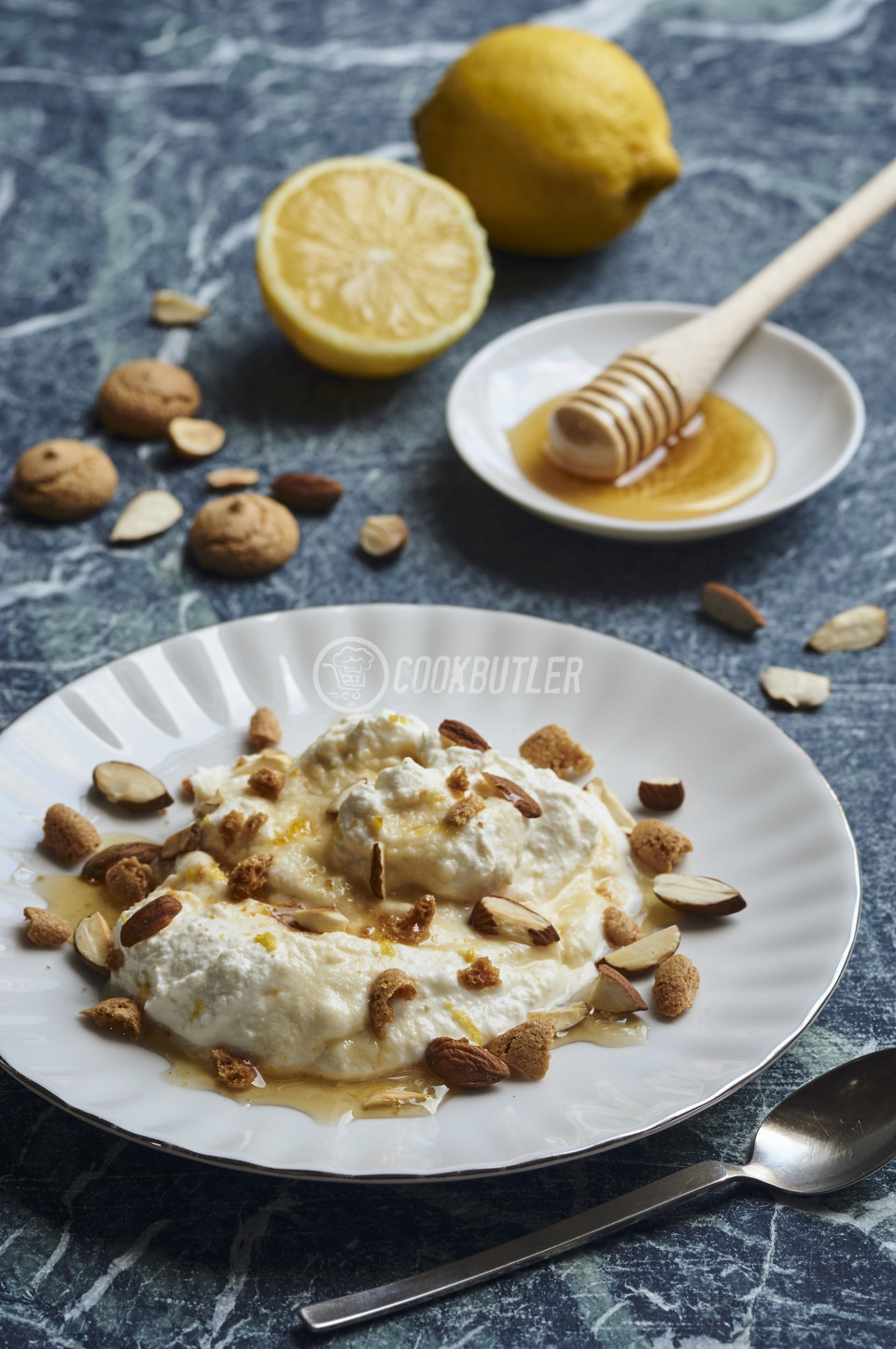 Ricotta pudding with lemon, almonds, amarettini and honey | preview
